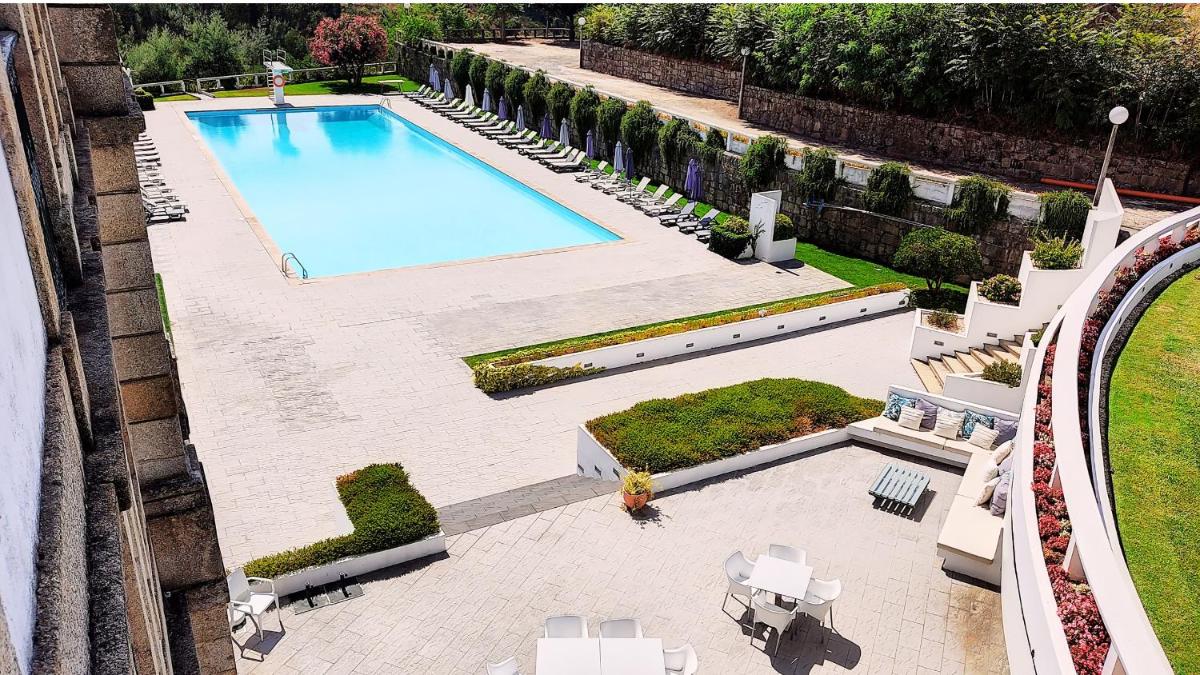 A piscina em ou perto de Grande Hotel das Caldas da Felgueira