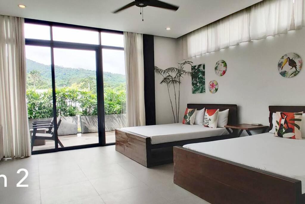 Diwata Villa - Casa Tropica Modern Villa - Housity