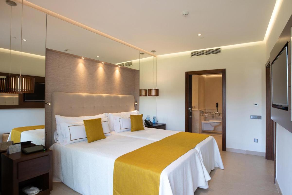 Cama o camas de una habitación en GF Victoria