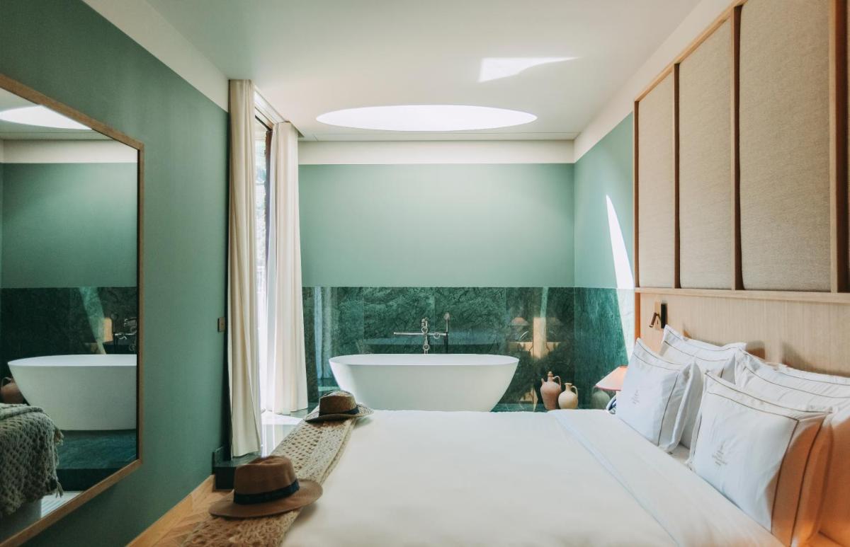 Uma cama ou camas num quarto em Torel Quinta da Vacaria - Douro Valley