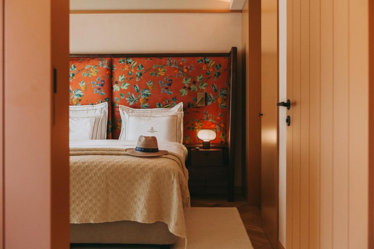 Uma cama ou camas num quarto em Torel Quinta da Vacaria - Douro Valley