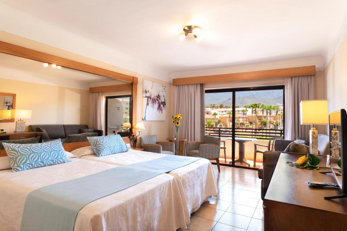 Cama o camas de una habitación en GF Fañabe