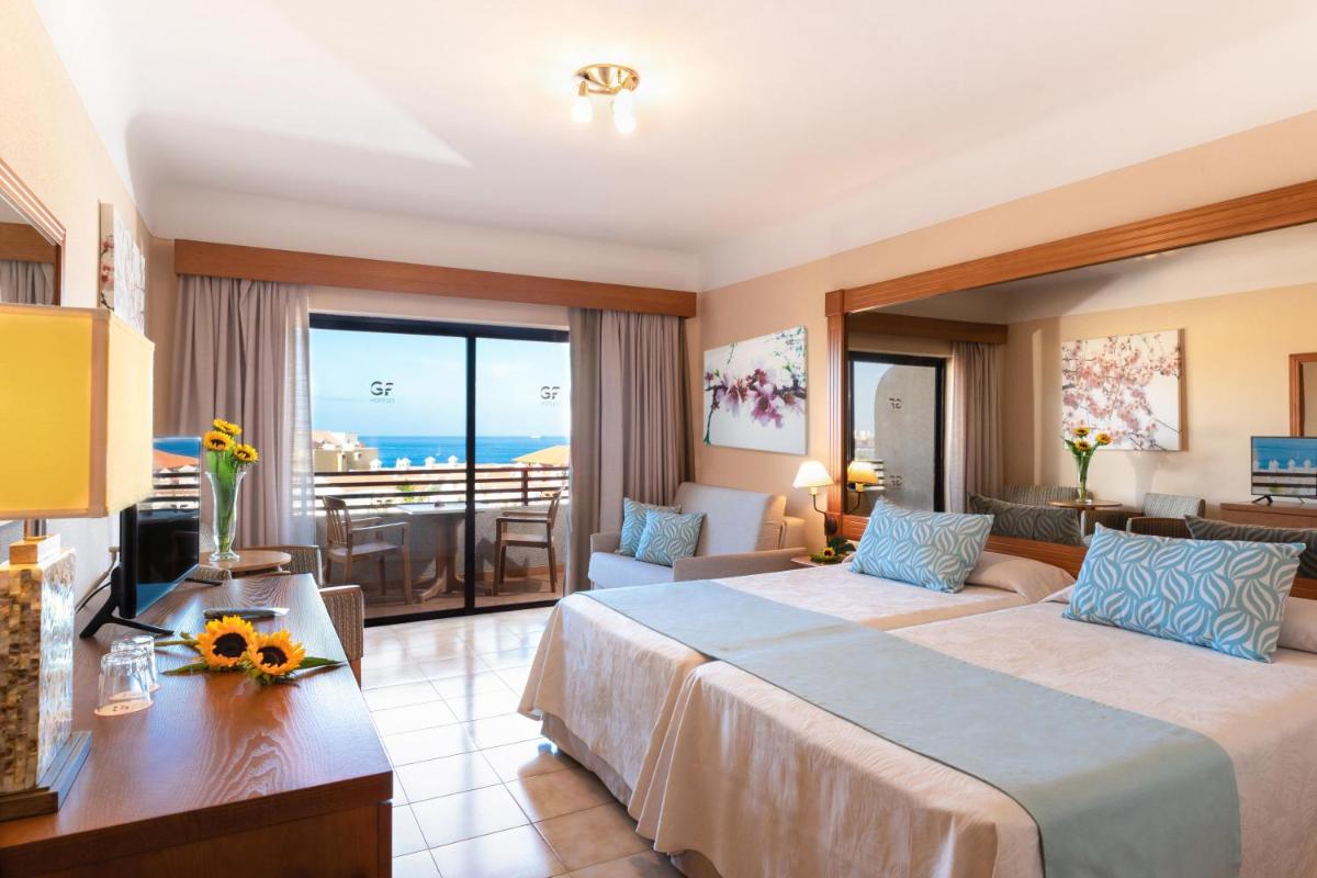 Cama o camas de una habitación en GF Fañabe
