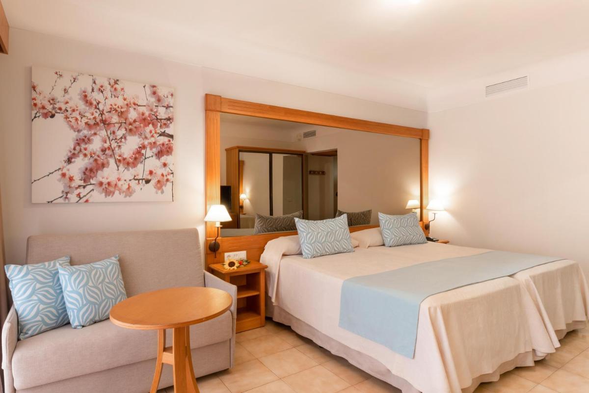 Cama o camas de una habitación en GF Fañabe