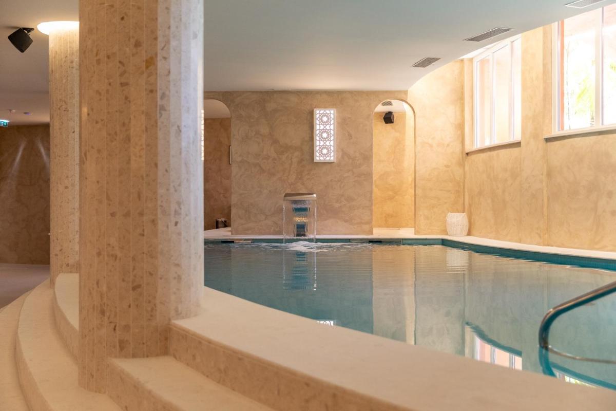 A piscina em ou perto de Belavista Da Luz - Wellness & Lifestyle Hotel