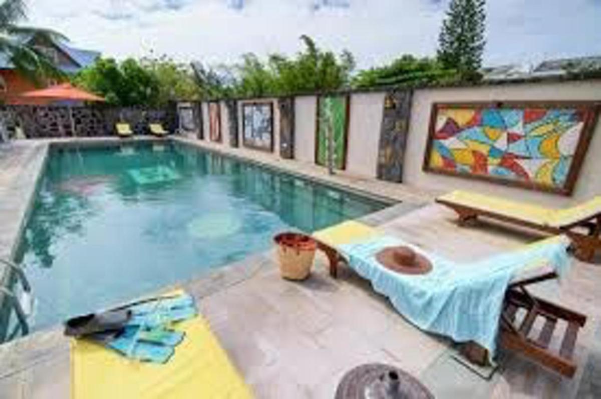 Modern Apartment in Grand Baie sea view shared pool - Housity