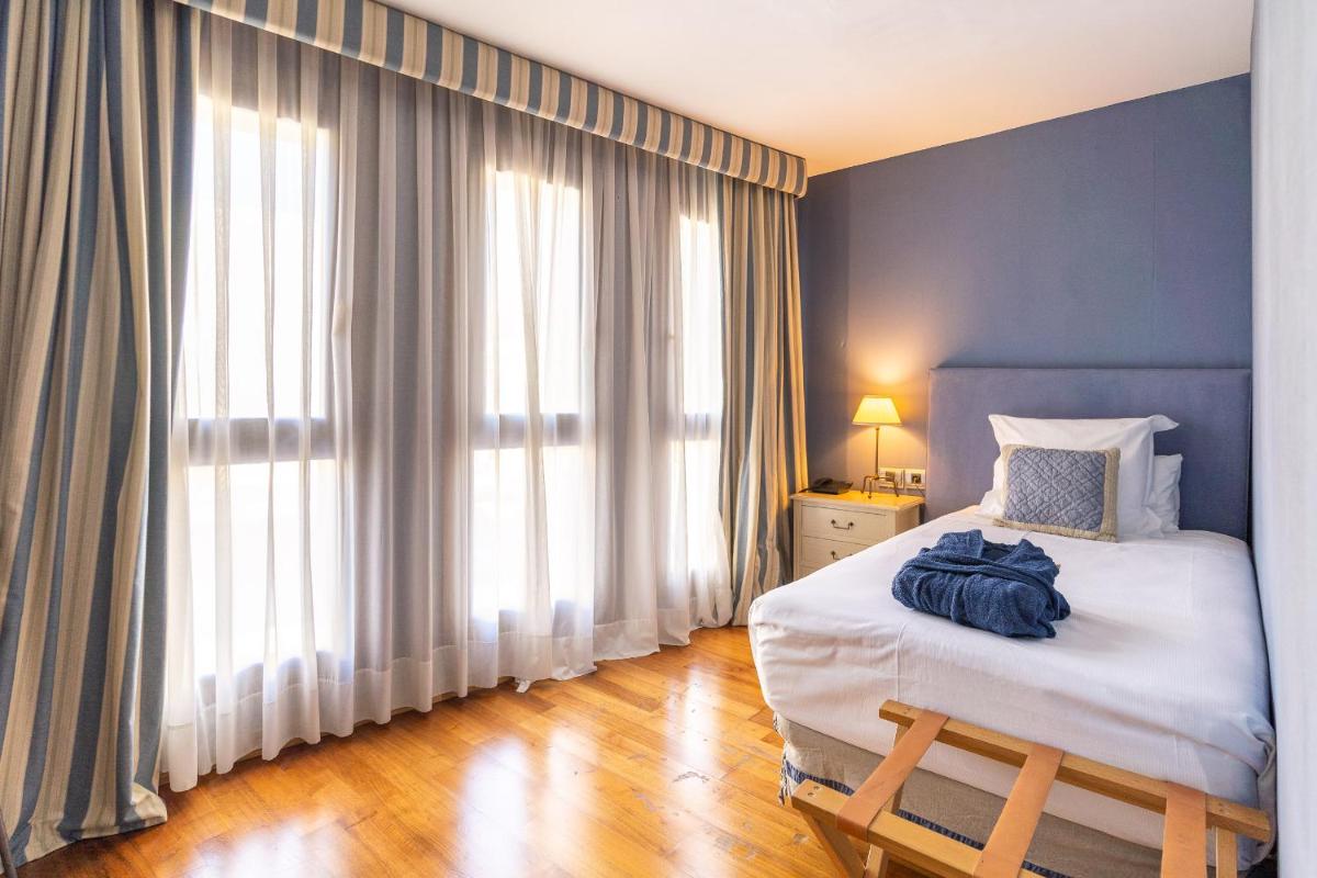 Cama o camas de una habitación en Hotel Blancafort Spa Termal
