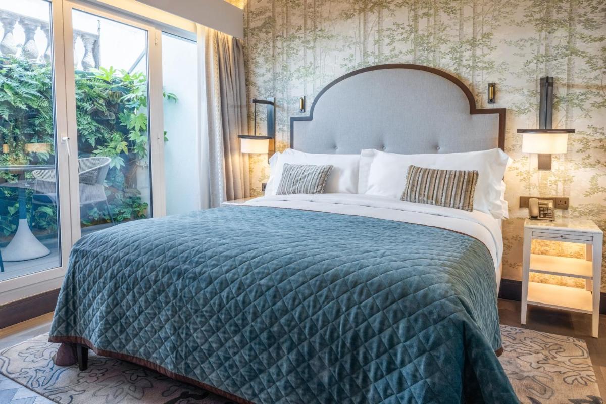 Uma cama ou camas num quarto em InterContinental Porto - Palacio das Cardosas by IHG