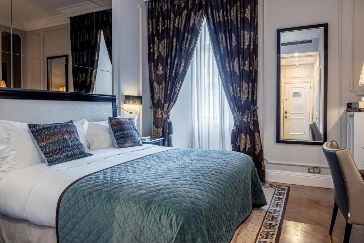 Uma cama ou camas num quarto em InterContinental Porto - Palacio das Cardosas by IHG