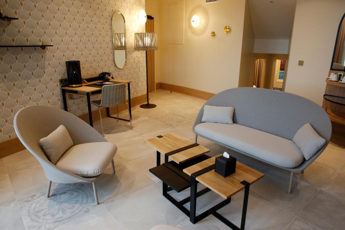 Coin salon dans l'établissement Splendid Hôtel & Spa