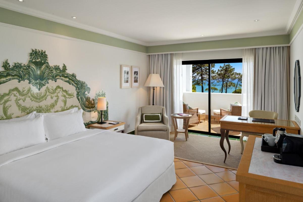 Uma cama ou camas num quarto em Pine Cliffs Hotel, a Luxury Collection Resort, Algarve