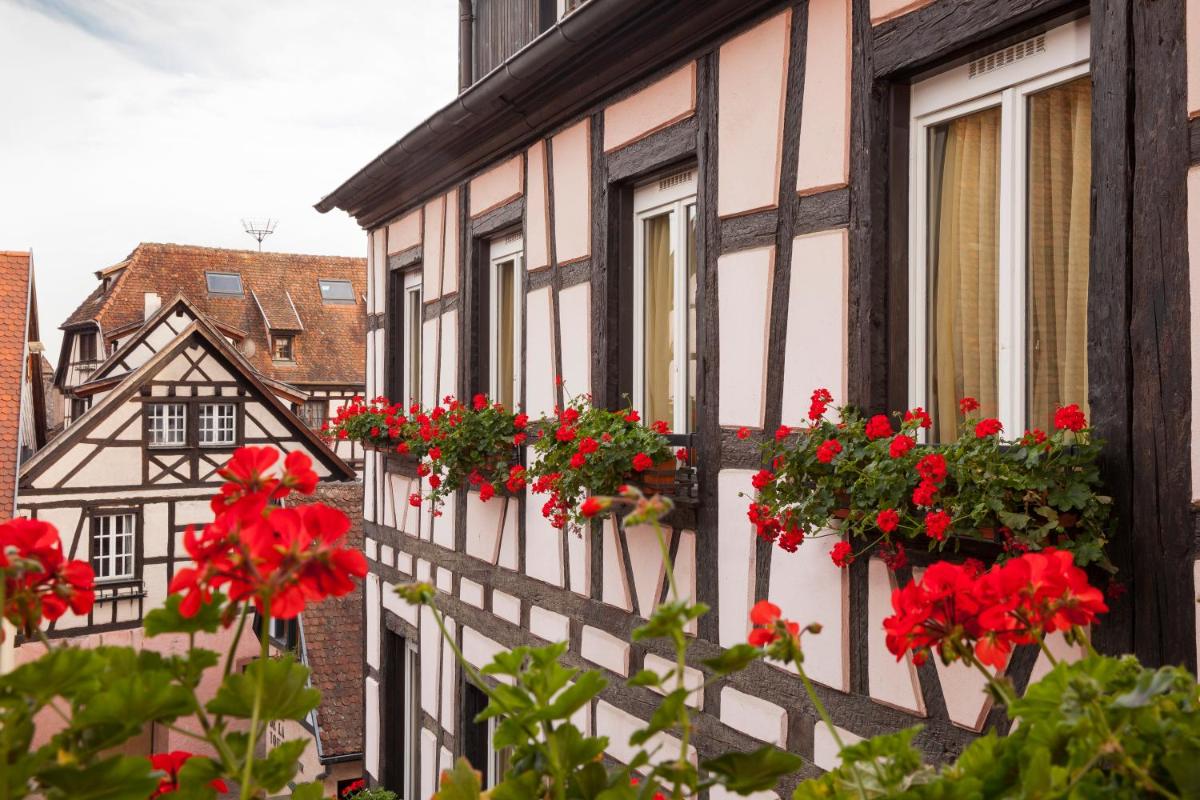 Balcon ou terrasse dans l'établissement Logis Hôtel de la Tour