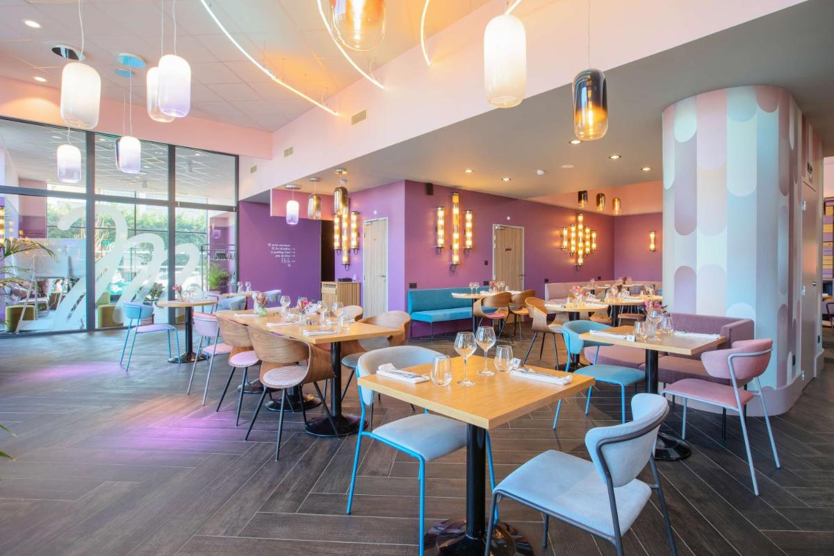 Restaurant ou autre lieu de restauration dans l'établissement Aiden by Best Western Clermont-Ferrand Hotel & Spa