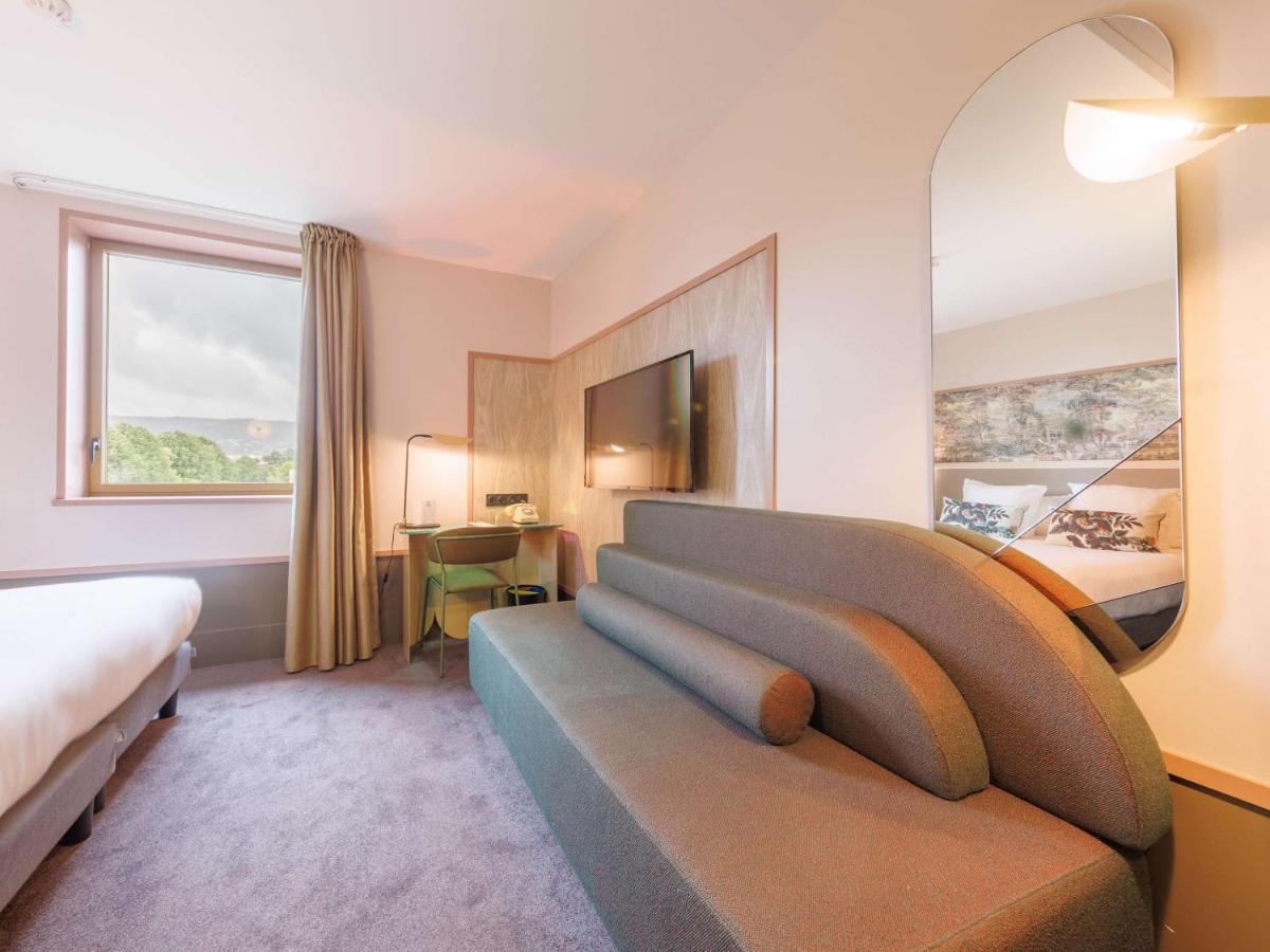 Un ou plusieurs lits dans un hébergement de l'établissement Aiden by Best Western Clermont-Ferrand Hotel & Spa