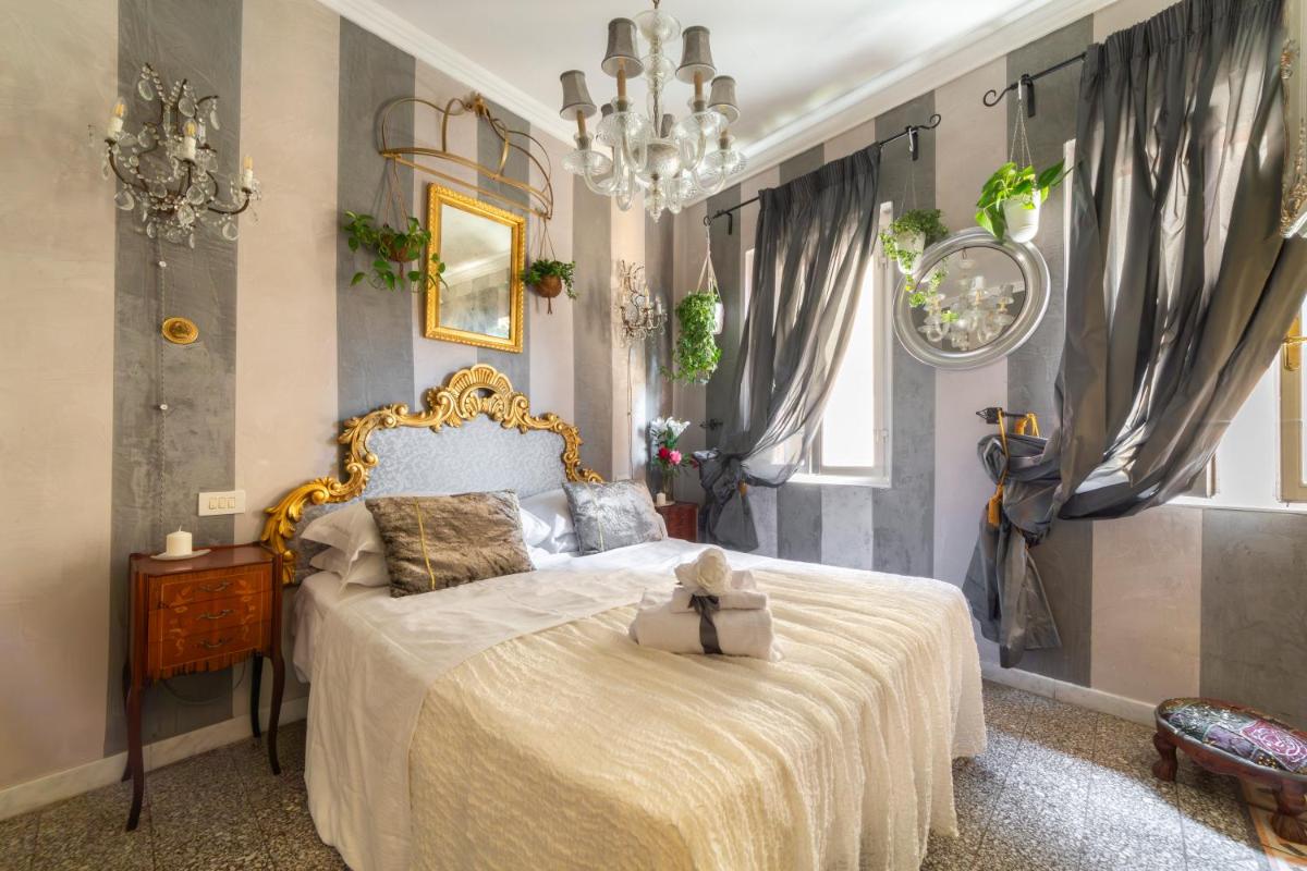 BIBI BOUTIQUE AREZZO Camere deluxe Cartazucchero & Cioccolato - Housity