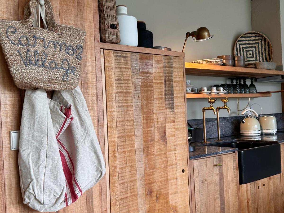 A cozinha ou kitchenette de Carmo's Boutique Hotel - Small Luxury Hotels of the World