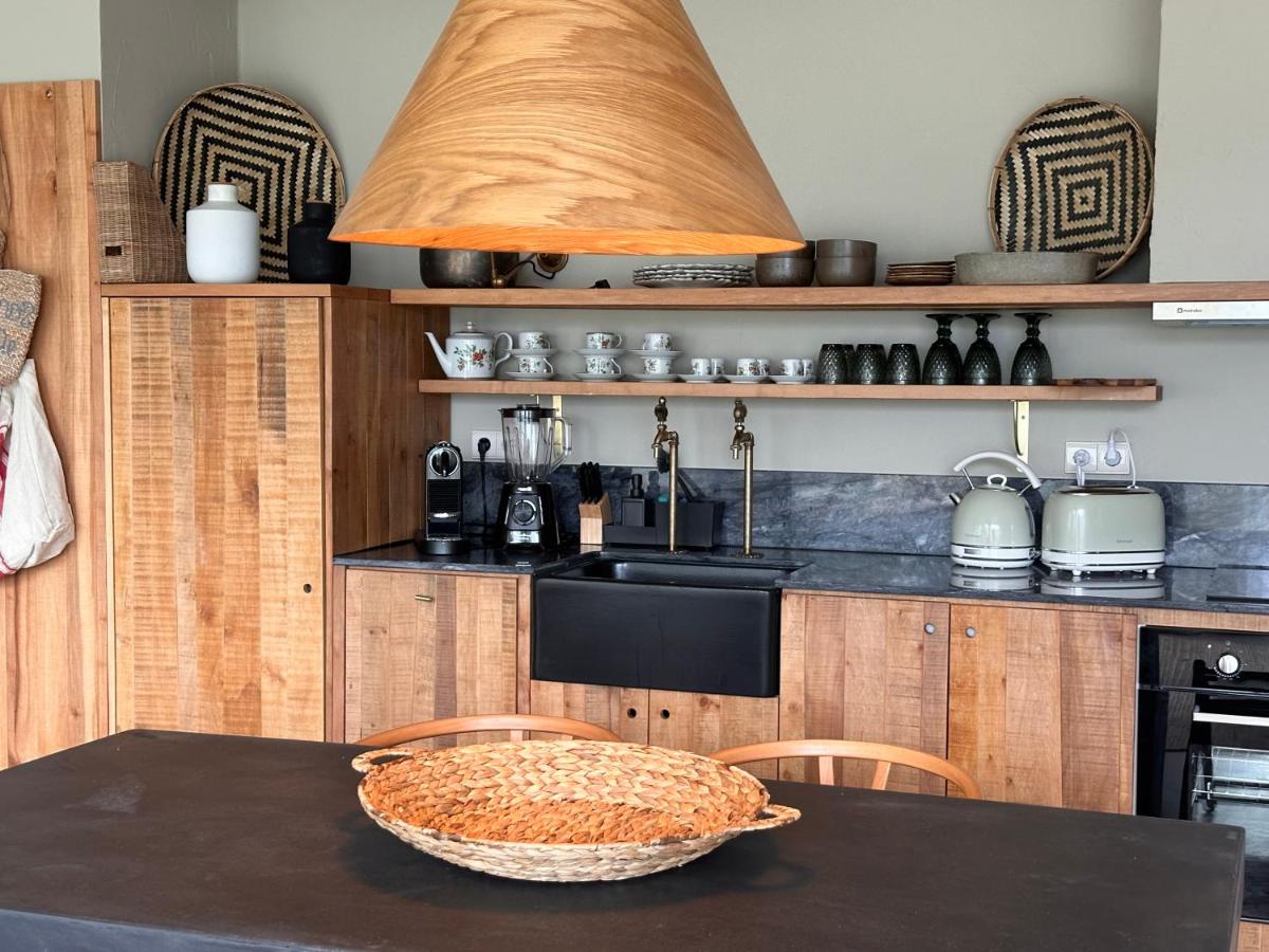 A cozinha ou kitchenette de Carmo's Boutique Hotel - Small Luxury Hotels of the World