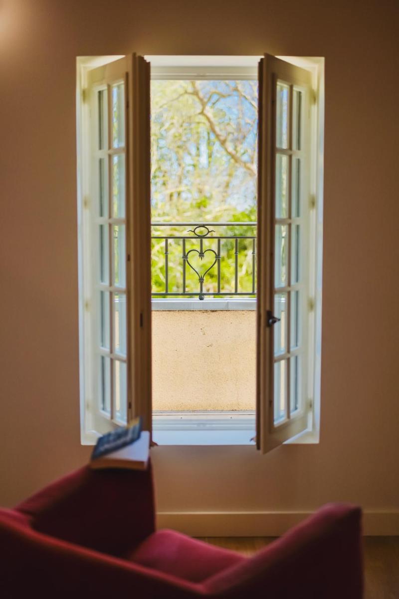 Balcon ou terrasse dans l'établissement Domaine de Coeurmandie - Hôtel Château