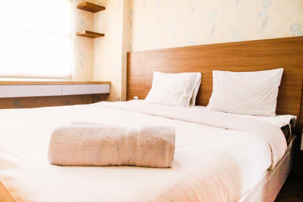 Cozy and Elegant 1BR Apartment Belmont Residence Puri By Travelio - Housity