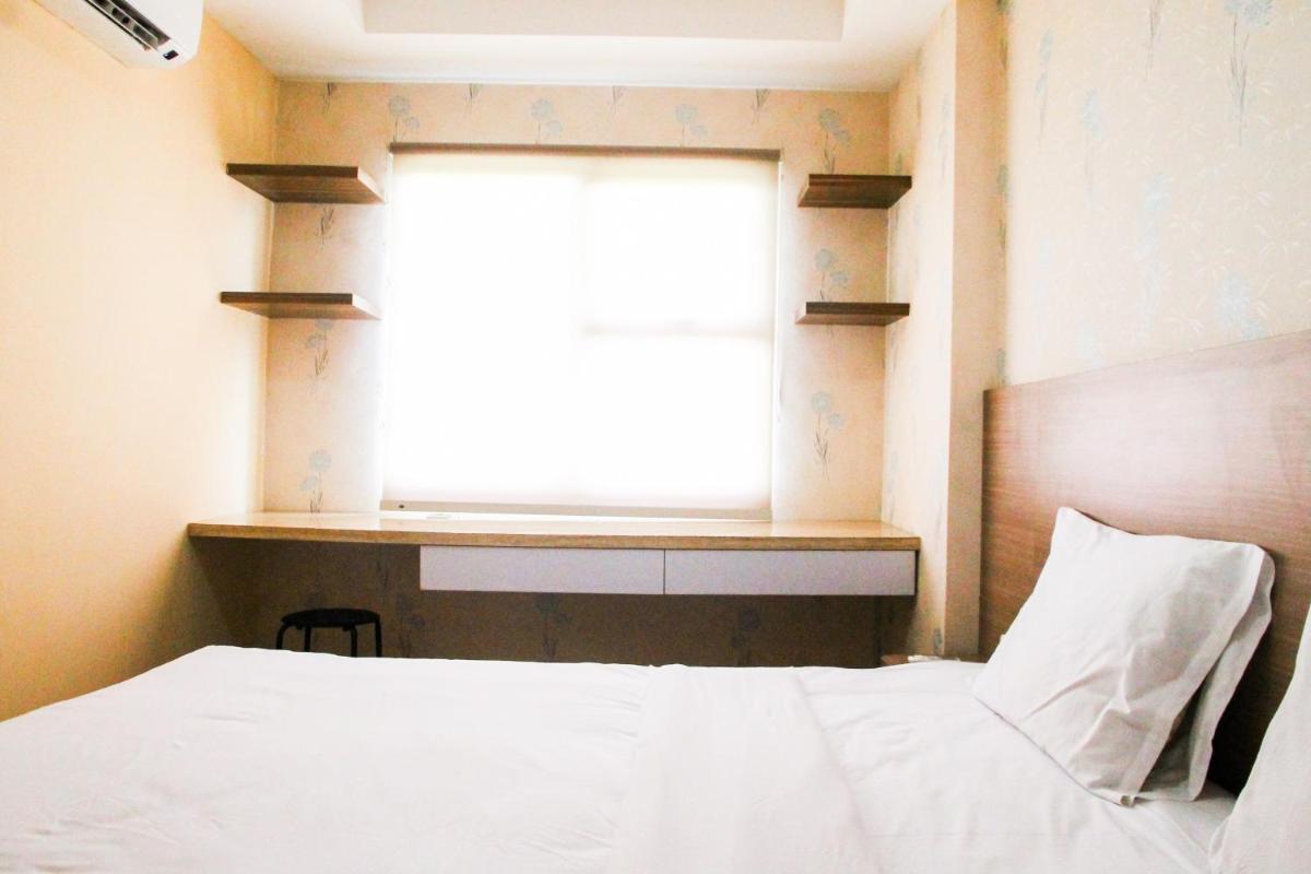 Cozy and Elegant 1BR Apartment Belmont Residence Puri By Travelio - Housity