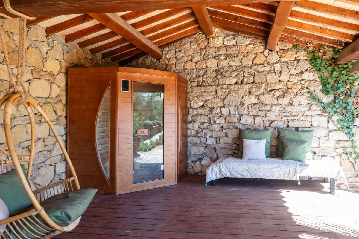 Un ou plusieurs lits dans un hébergement de l'établissement Hôtel - Restaurant & Spa La Magdeleine - Mathias Dandine