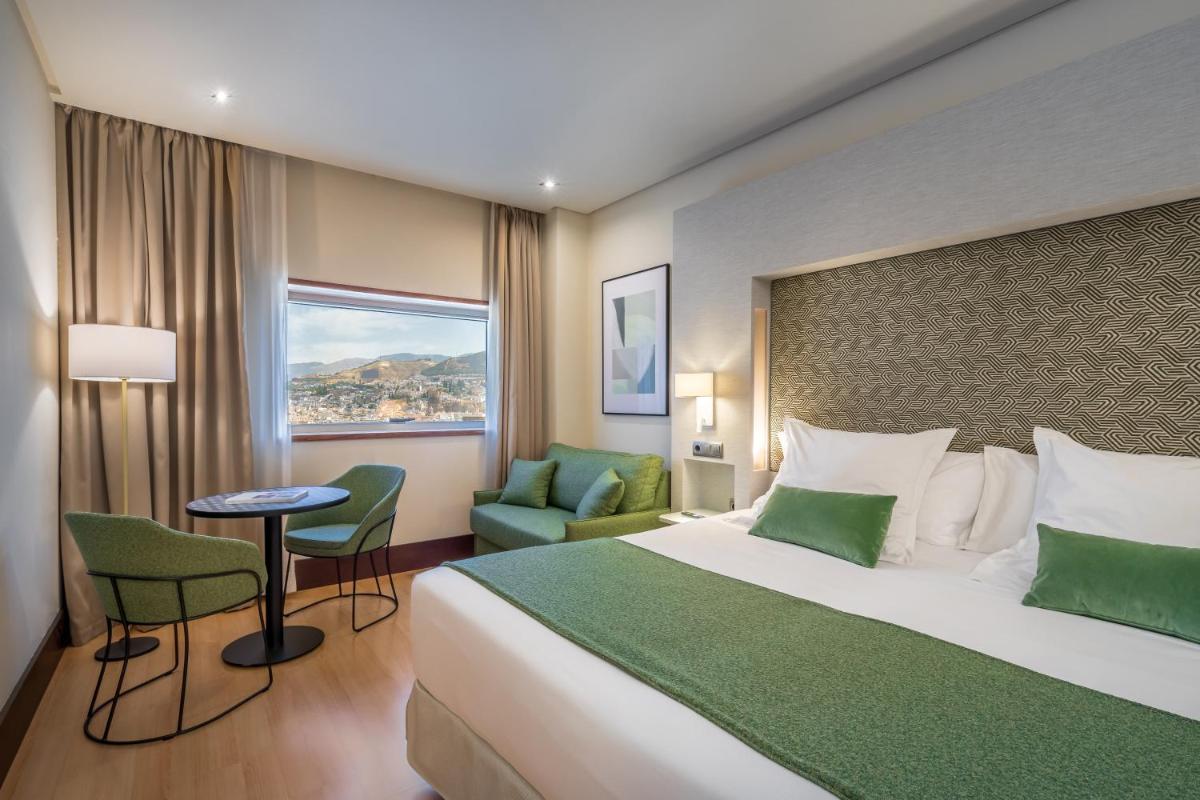 Cama o camas de una habitación en Barceló Granada Congress