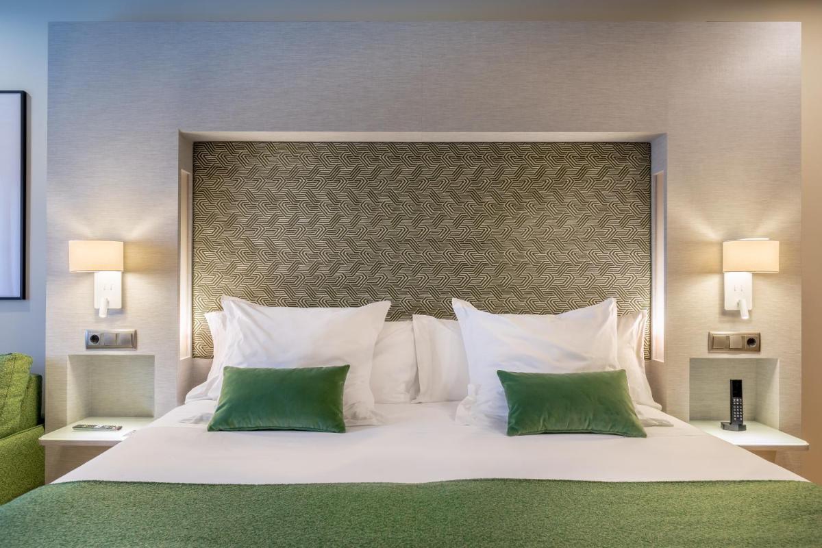 Cama o camas de una habitación en Barceló Granada Congress