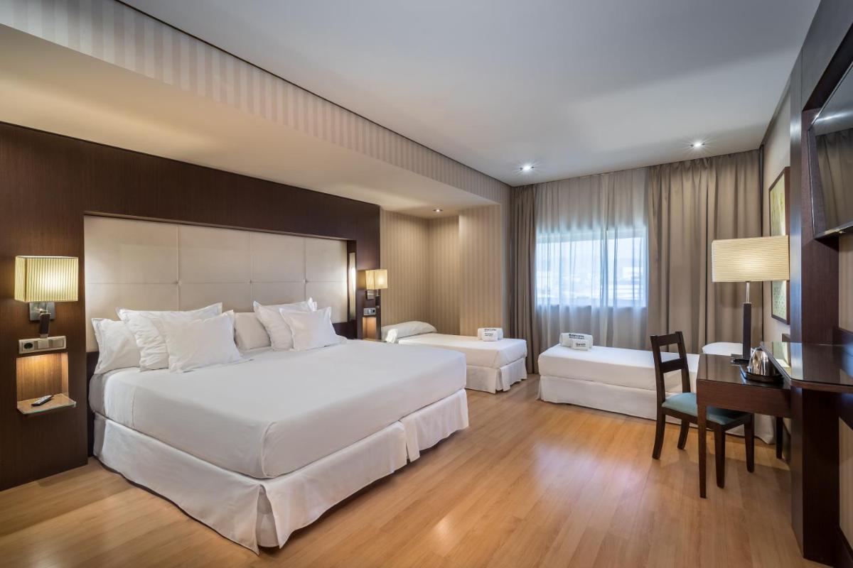 Cama o camas de una habitación en Barceló Granada Congress