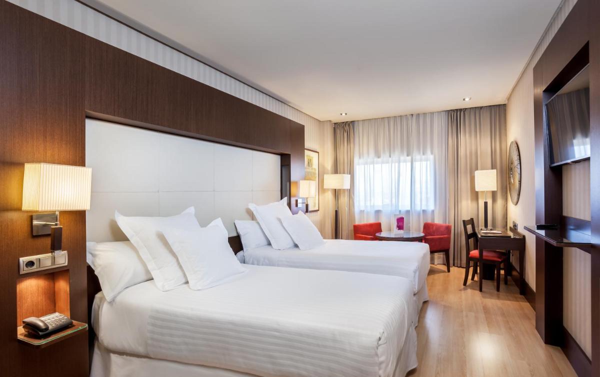Cama o camas de una habitación en Barceló Granada Congress