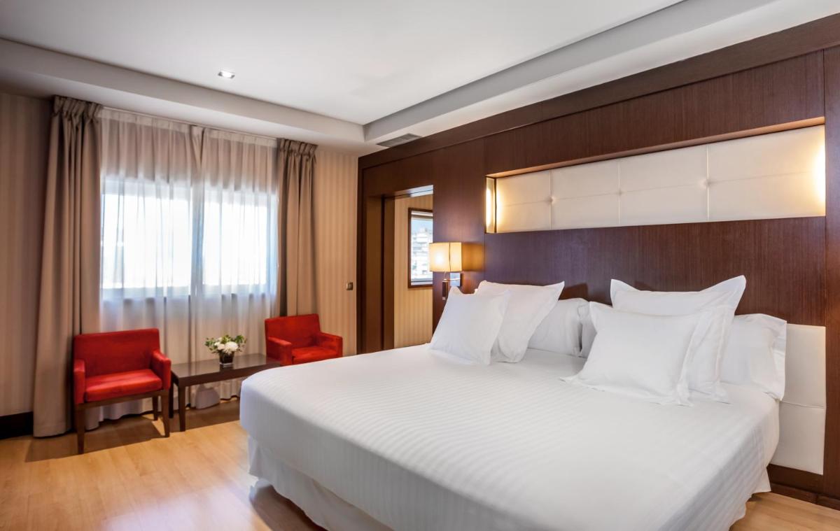 Cama o camas de una habitación en Barceló Granada Congress
