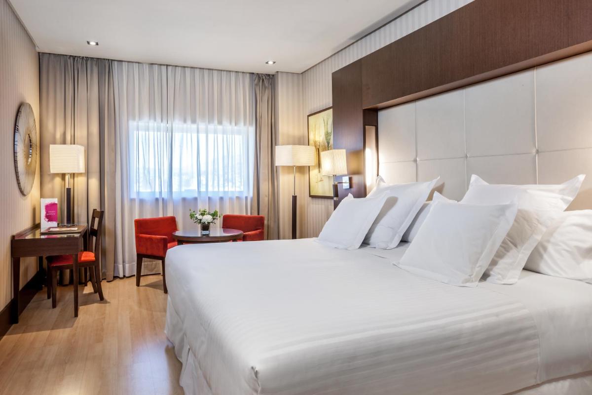Cama o camas de una habitación en Barceló Granada Congress