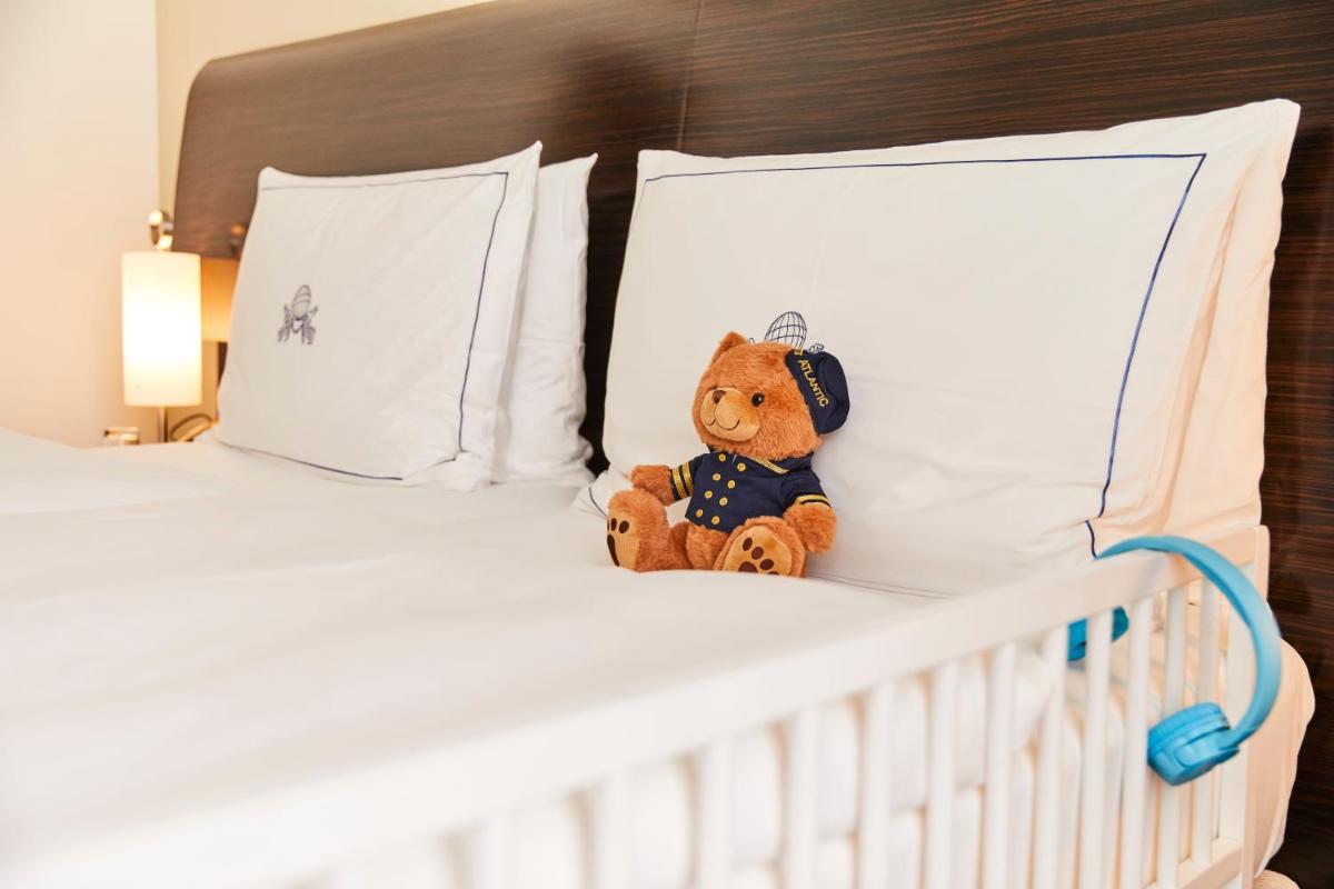 Ein Bett oder Betten in einem Zimmer der Unterkunft Hotel Atlantic Hamburg, Autograph Collection