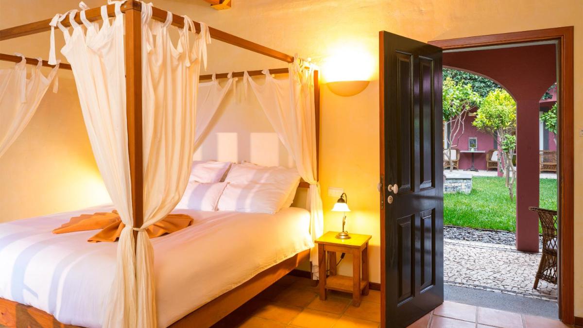 Uma cama ou camas num quarto em Atrio