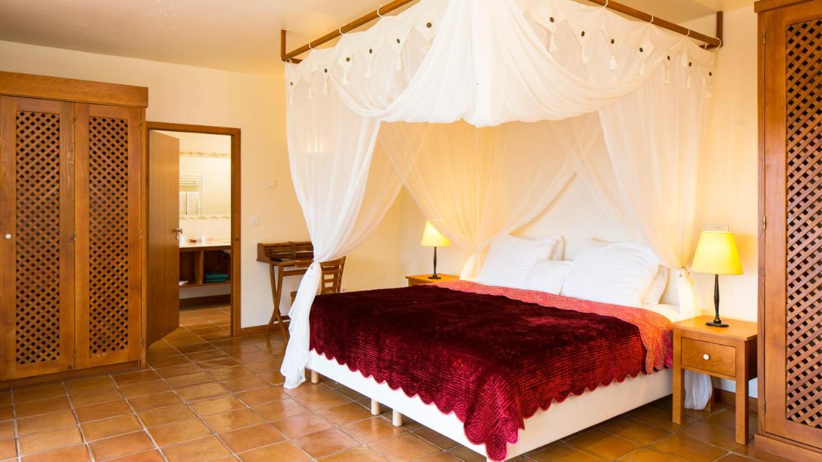 Uma cama ou camas num quarto em Atrio