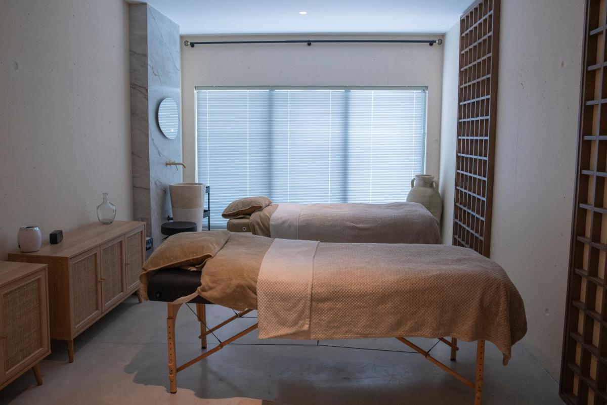 Un ou plusieurs lits dans un hébergement de l'établissement Ki Space Hotel & Spa - near Disneyland Paris