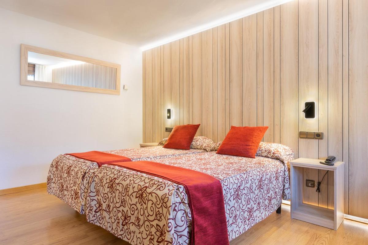 Cama o camas de una habitación en Hotel Eth Solan & SPA
