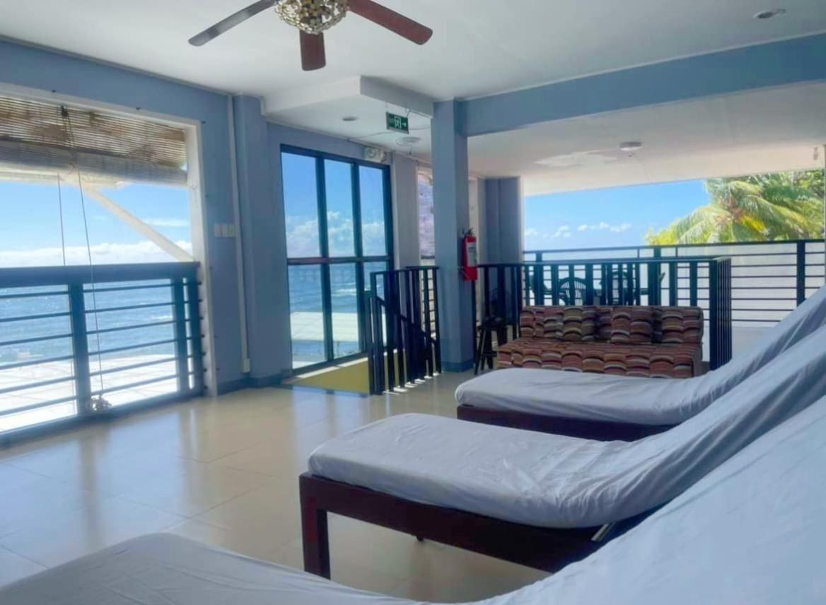 Family Beachfront Apartelle - Housity