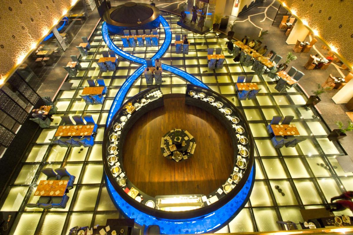 an overhead view of a food court in a mall at Sterlings Mac Hotel in Bengaluru