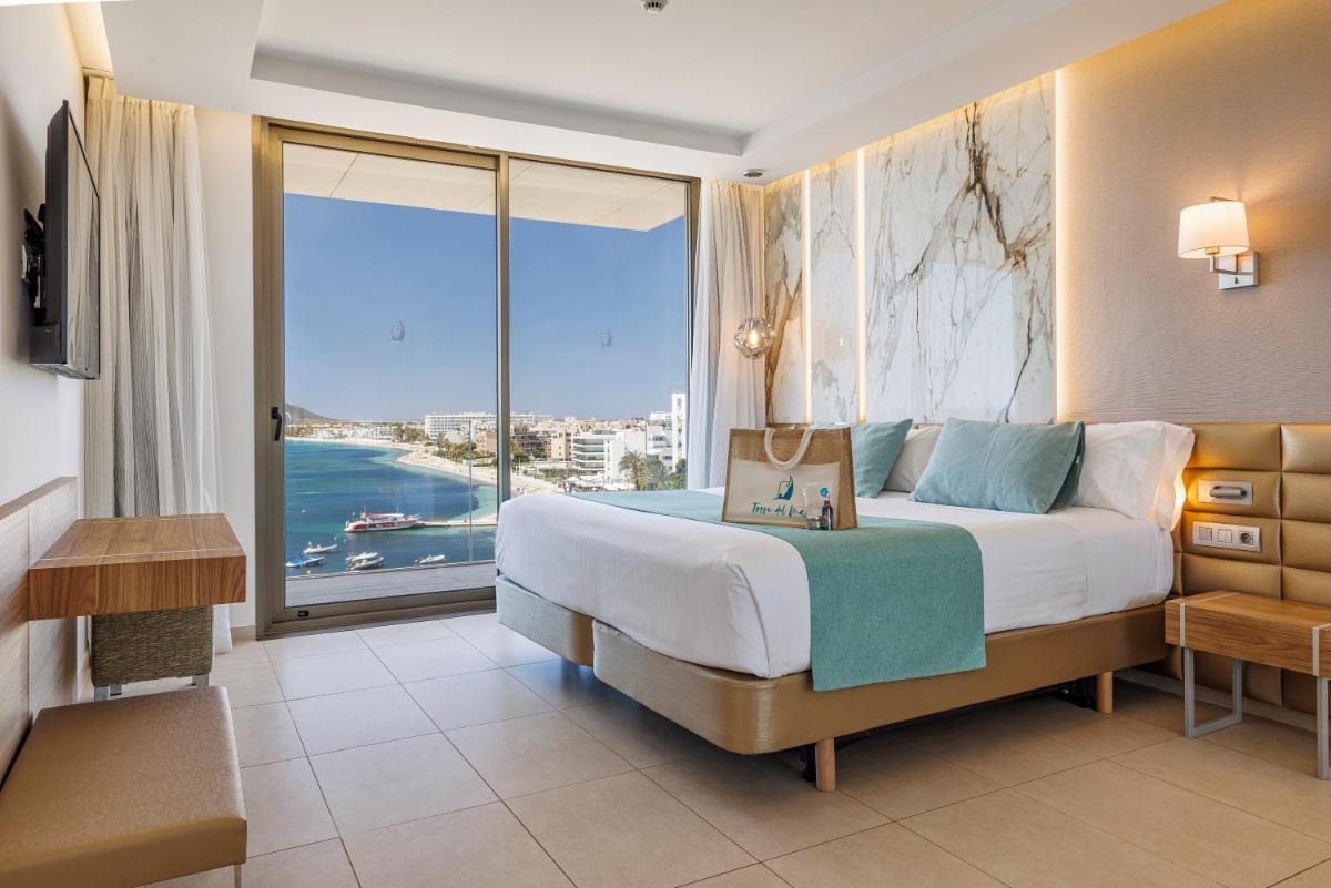 Cama o camas de una habitación en Hotel Torre del Mar - Ibiza