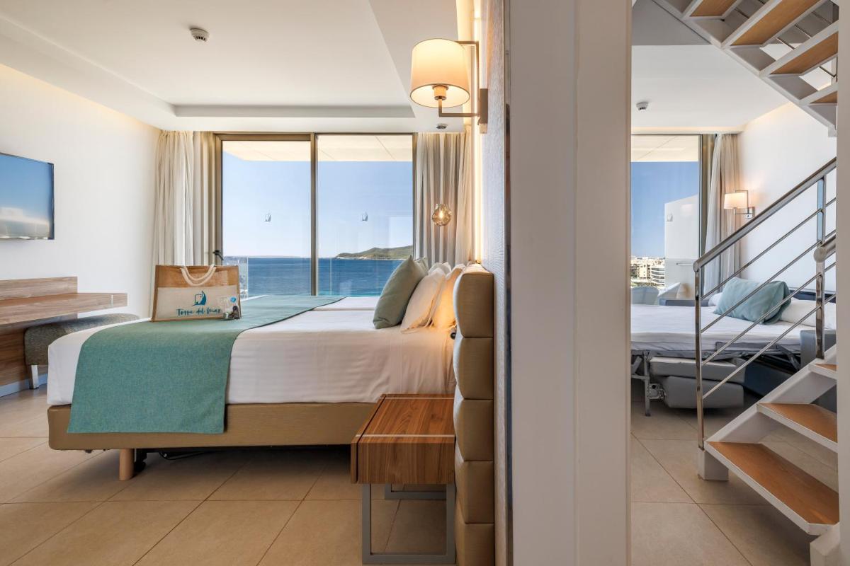 Cama o camas de una habitación en Hotel Torre del Mar - Ibiza