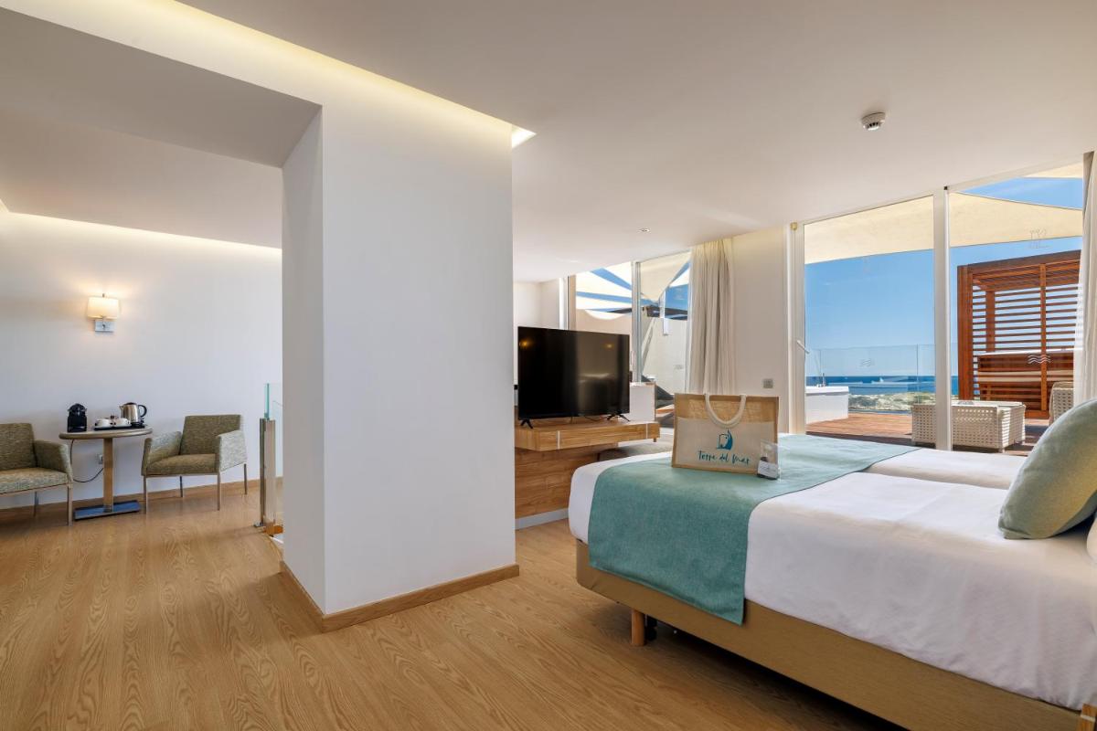 Cama o camas de una habitación en Hotel Torre del Mar - Ibiza