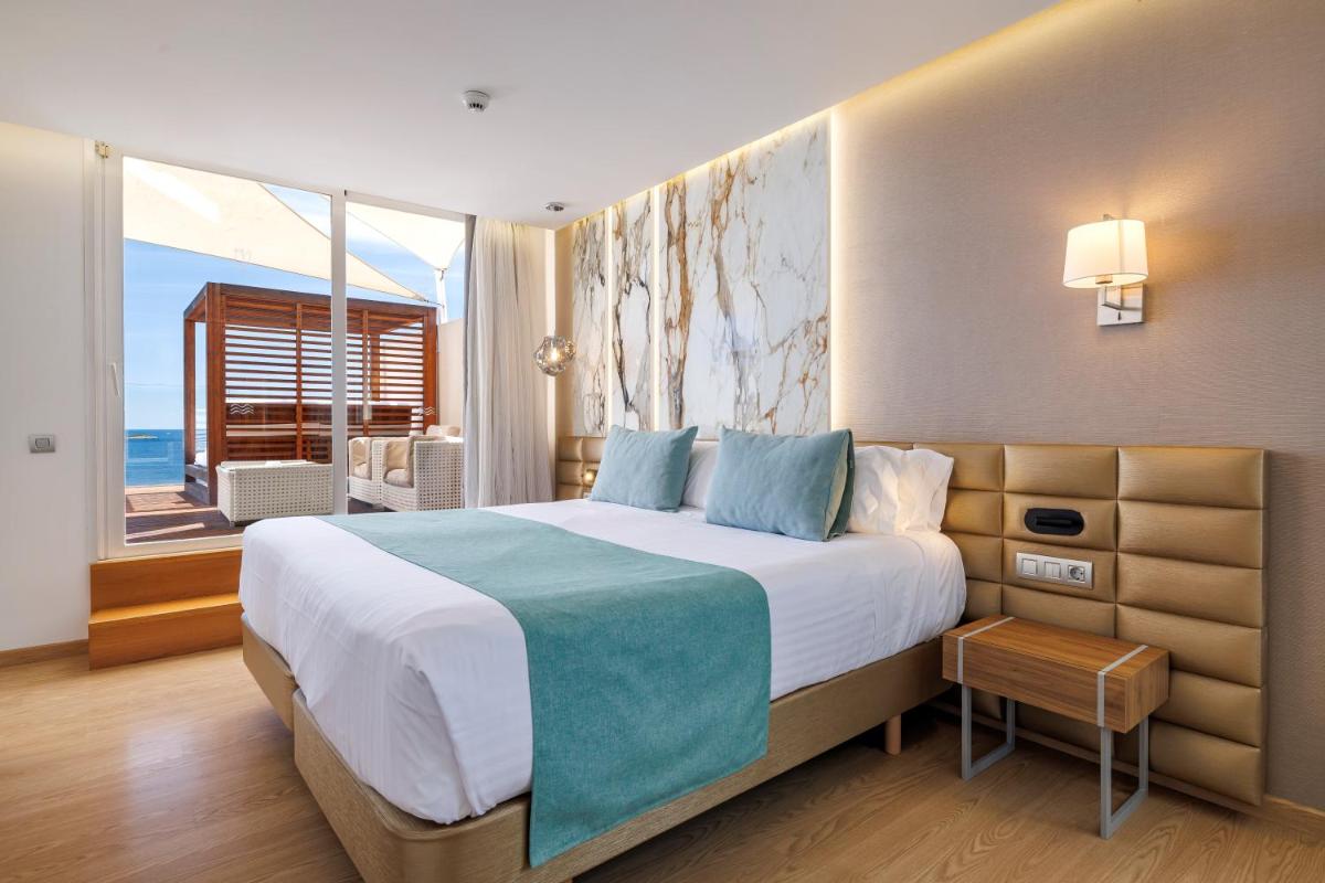 Cama o camas de una habitación en Hotel Torre del Mar - Ibiza