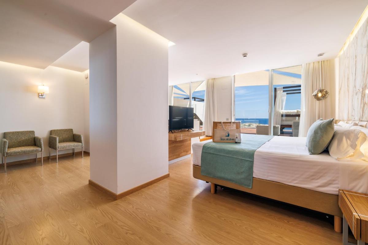 Cama o camas de una habitación en Hotel Torre del Mar - Ibiza