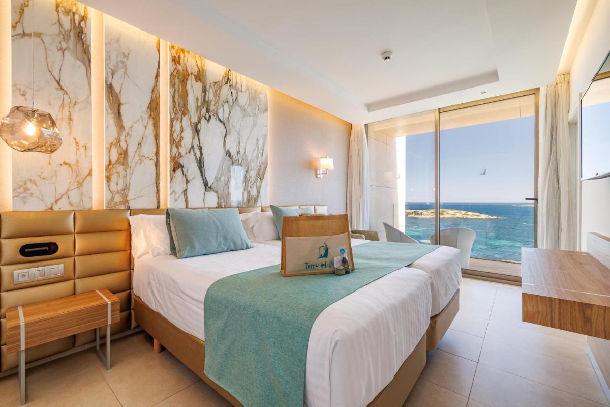 Cama o camas de una habitación en Hotel Torre del Mar - Ibiza