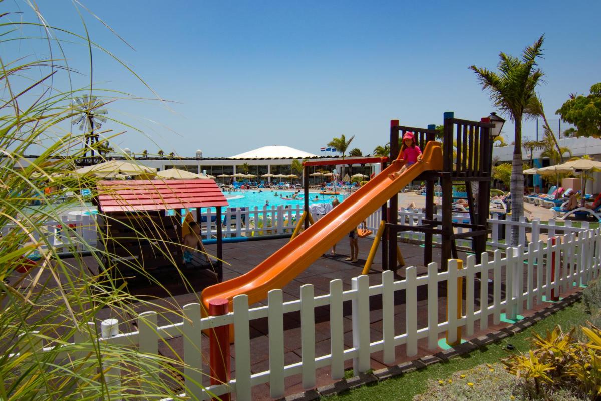 Piscina en o cerca de Relaxia Lanzasur Club - Aqualava Water Park