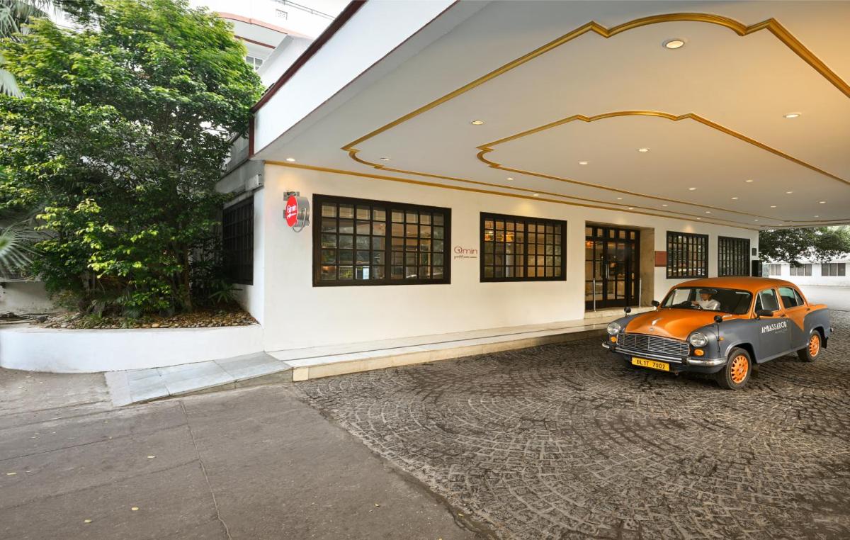 an old car parked outside of a building at Ambassador, New Delhi - IHCL SeleQtions in New Delhi an old car parked outside of a building at Ambassador, New Delhi - IHCL SeleQtions in New Delhi
