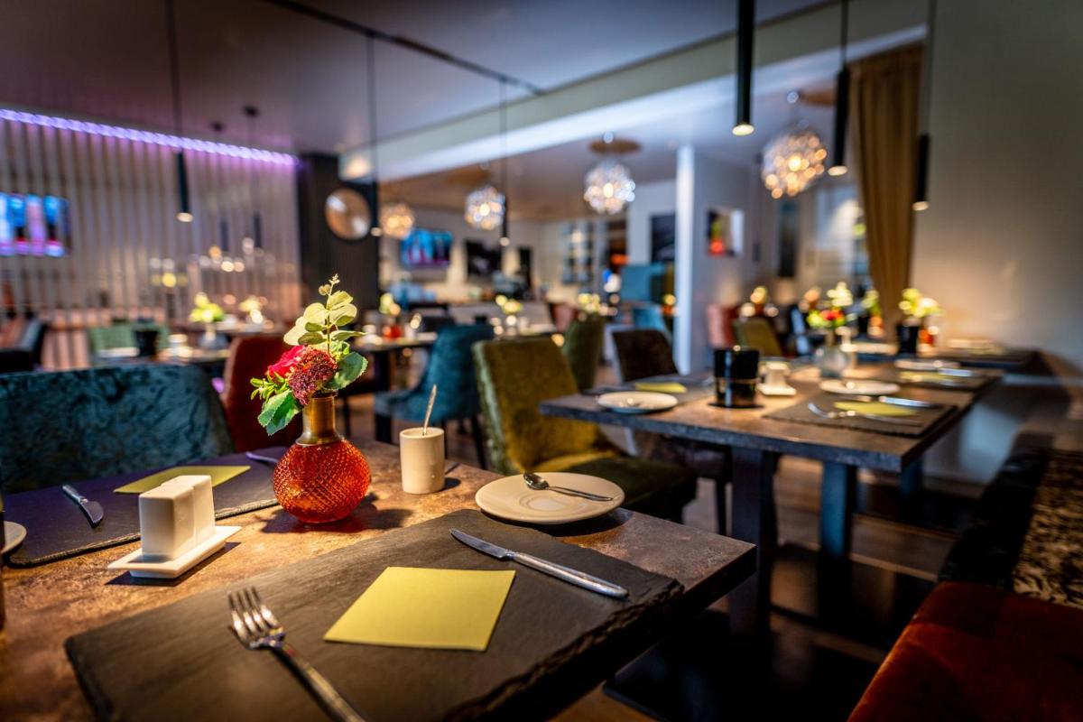 Friendly Cityhotel Oktopus - Housity