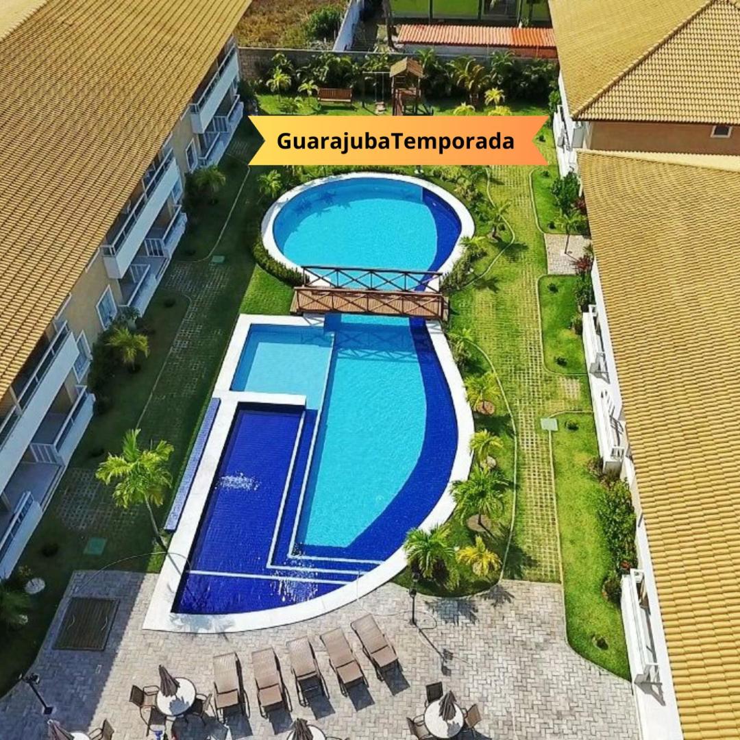 Guarajuba Village Verano A01, térreo - GUARAJUBA TEMPORADA, viva mais de uma experiência de hospedagem conosco! - Housity