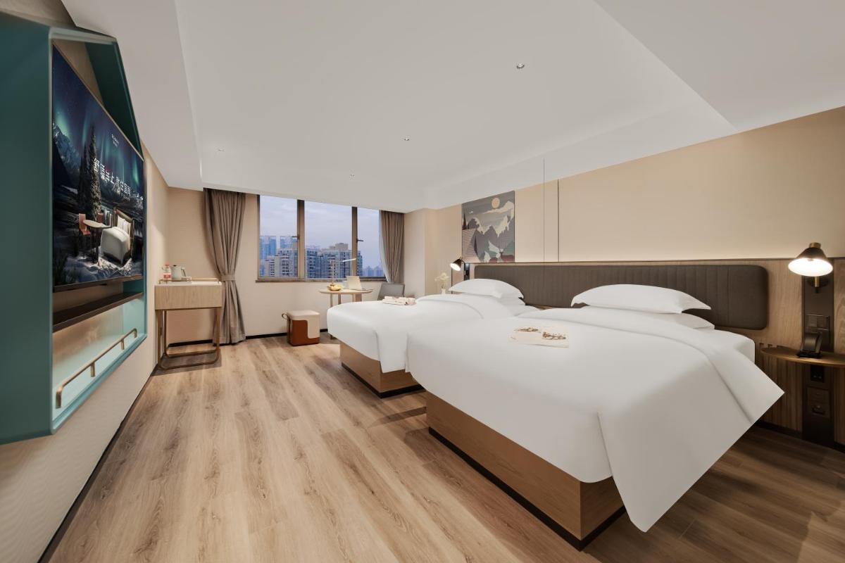 Echarm Hotel Guangzhou Baiyun Station Julong Metro Station - Hizvo