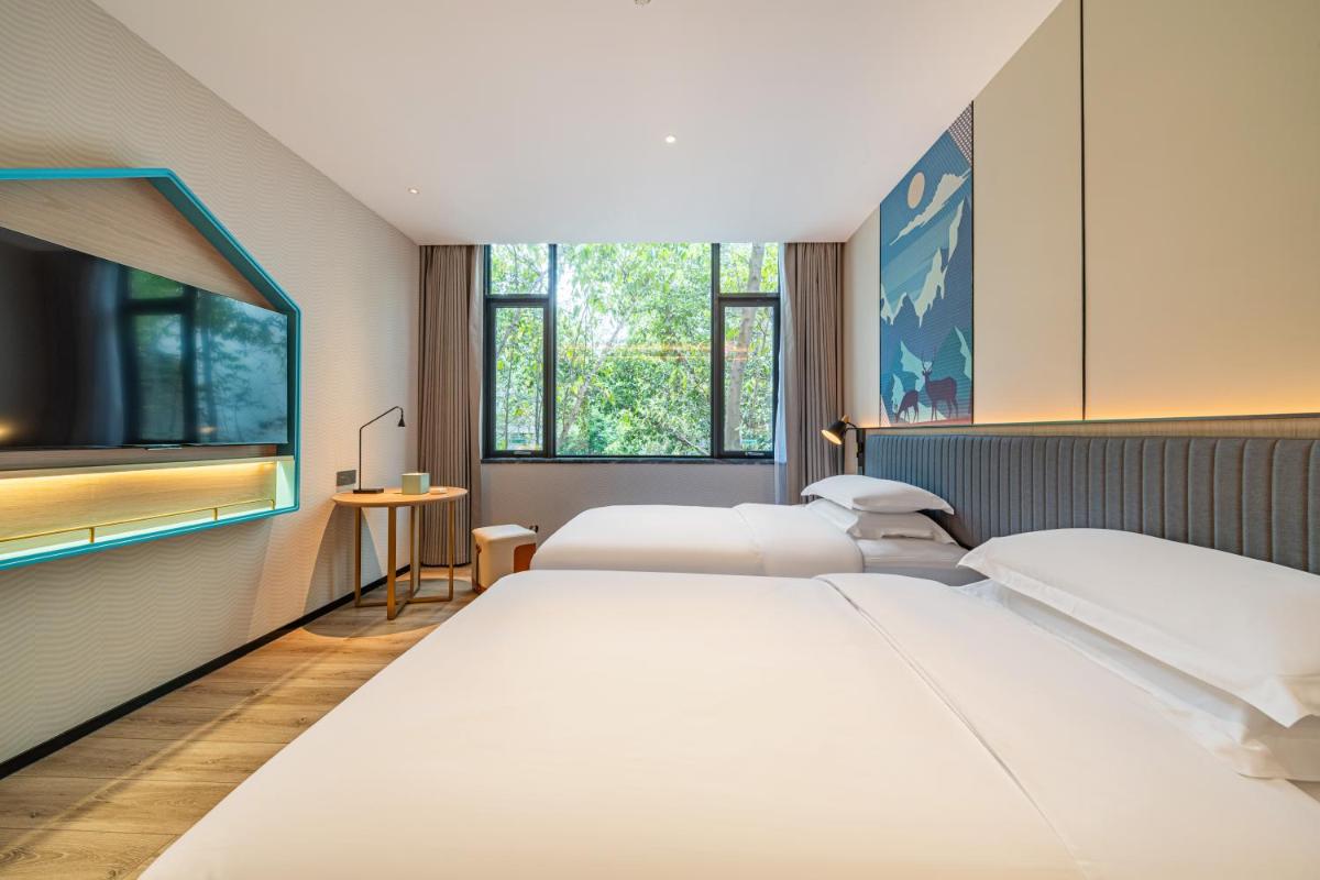 Echarm Hotel Guangzhou Baiyun Station Julong Metro Station - Hizvo